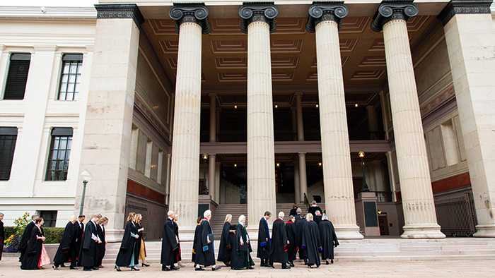 Procession with honorary doctors outside the University Aula